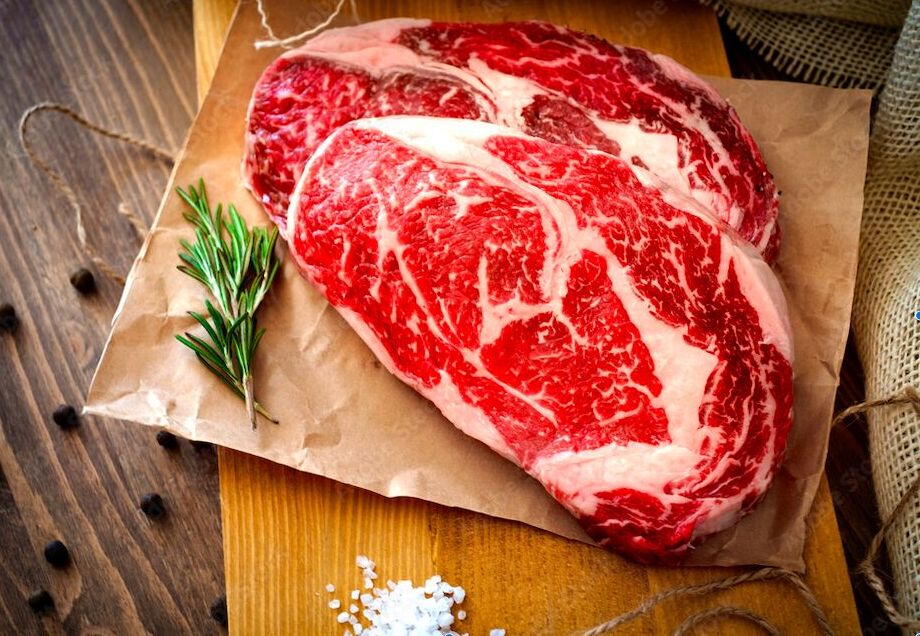 Raw boneless ribeye with expert marbling